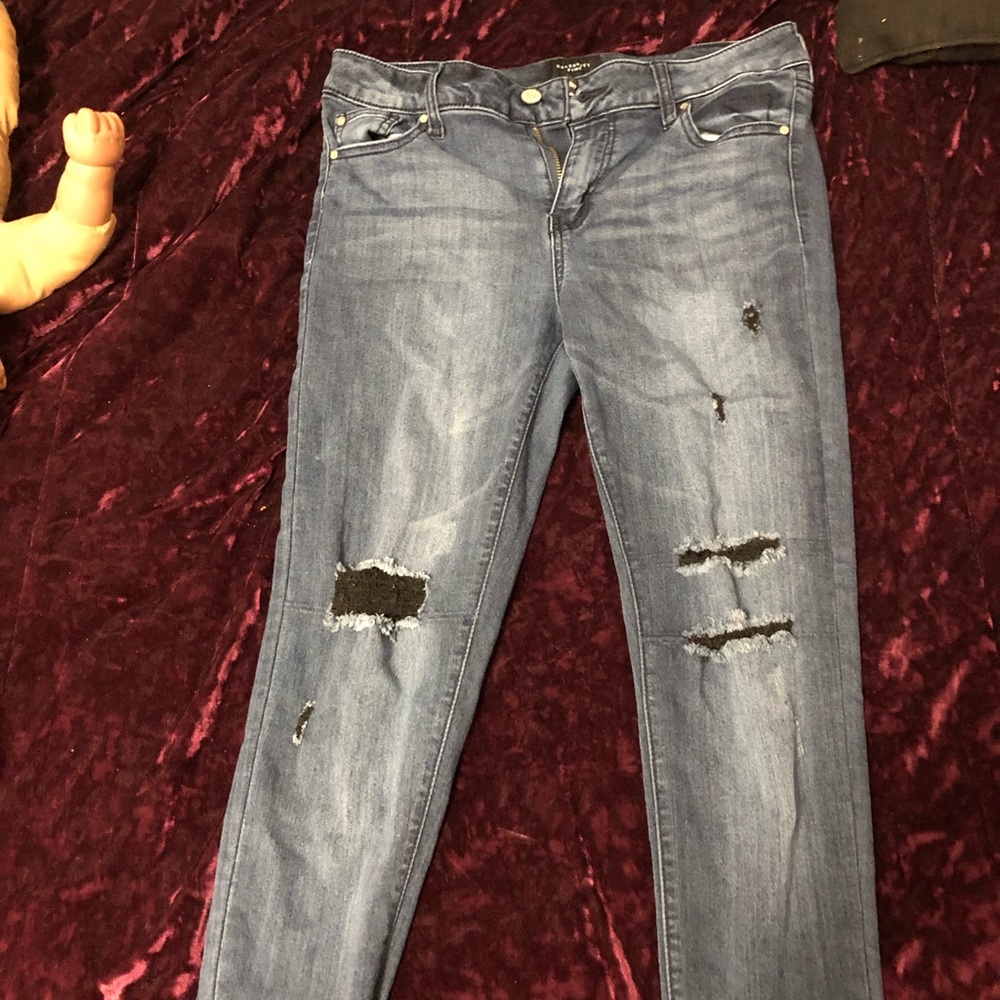 Blue jeans with black rips! Celebrity pink